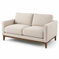 Divano a due posti in tessuto beige con struttura in legno