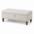 Panca con contenitore in tessuto beige con gambe in legno